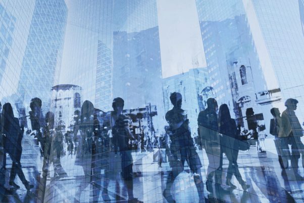 double exposure of business people walking on busy street of modern city, office buildings corporate background