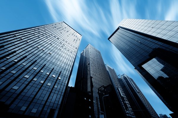 Modern buildings in downtown and blue sunlight