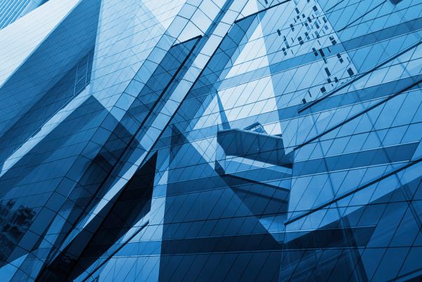 Glass of modern tower for business background